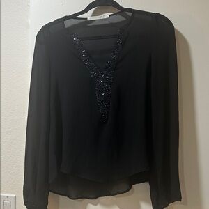 Black Sheer Blouse with v-neck rhinestone embellishment.